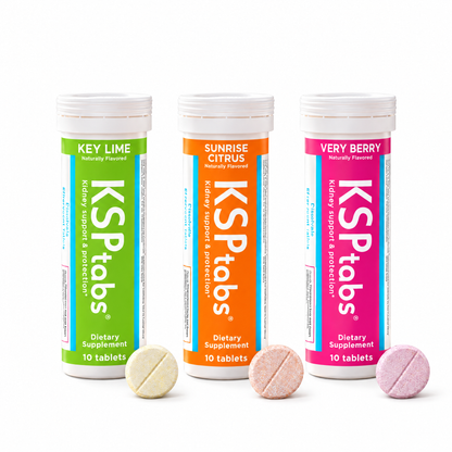 Three KSPtabs dietary supplement bottles in Key Lime, Sunrise Citrus, and Very Berry flavors, shown with three round scored KSPtabs in front on a white background.